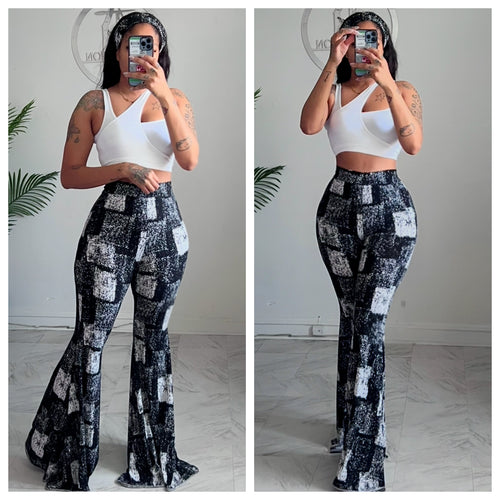 Blk/white  bell bottoms and head band